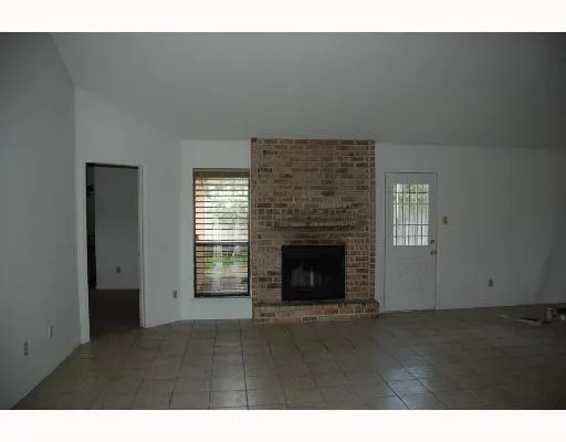 a living room with a fireplace