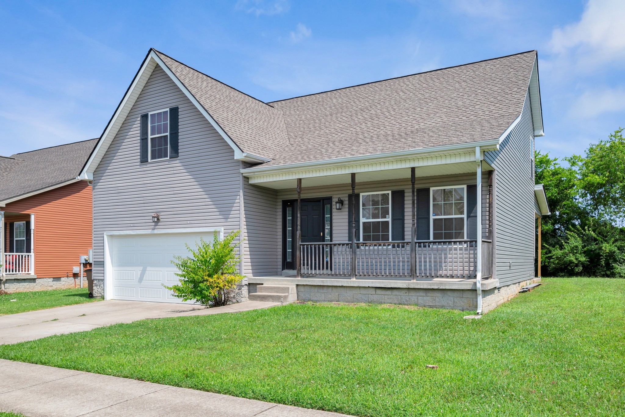756 Maylene Drive Madison, TN 37115 - Photo 1 of 25 a front view of a house with a garden