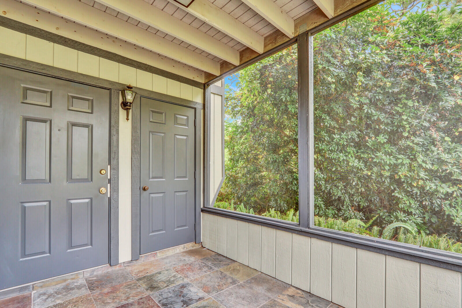 8356 Southeast Croft Circle, Unit O3 Hobe Sound, FL 33455 - Photo 17 of 20 a view of a porch with a porch
