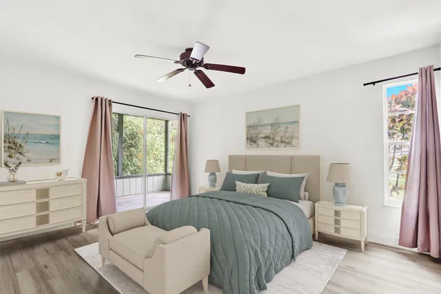 a bedroom with a bed and glass window