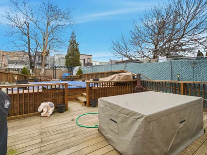 a view of a balcony with chairs