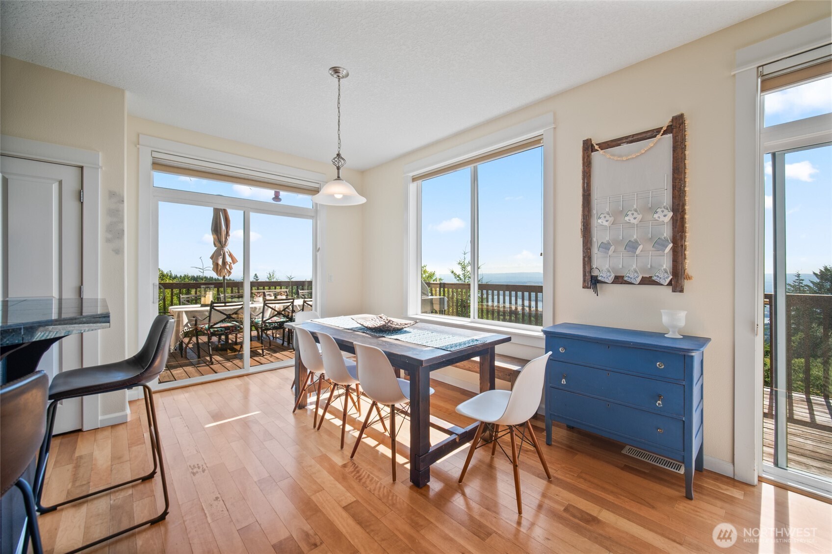 172 Blackjack Drive Kalama, WA 98625 - Photo 17 of 40 a view of a dining room with furniture window and wooden floor