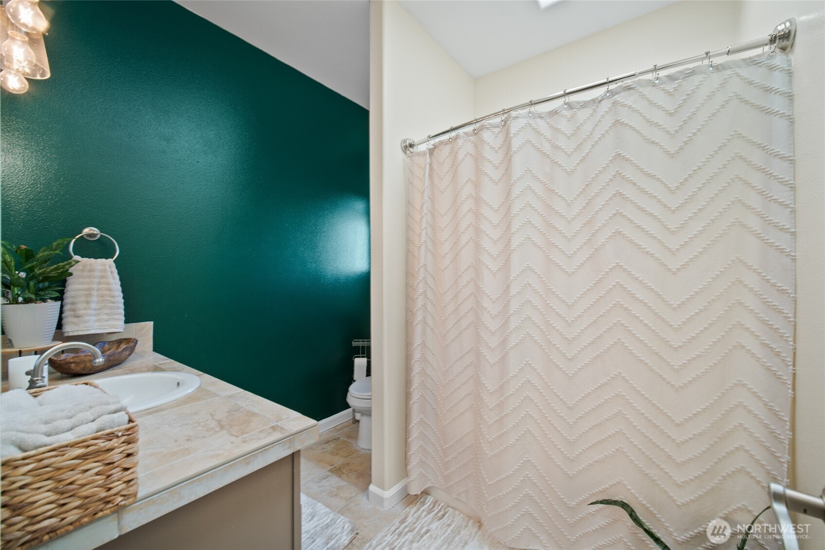 172 Blackjack Drive Kalama, WA 98625 - Photo 19 of 40 a bathroom with a sink and vanity