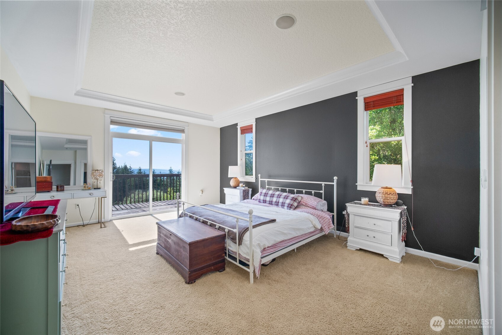 172 Blackjack Drive Kalama, WA 98625 - Photo 22 of 40 a bedroom with a bed and large window