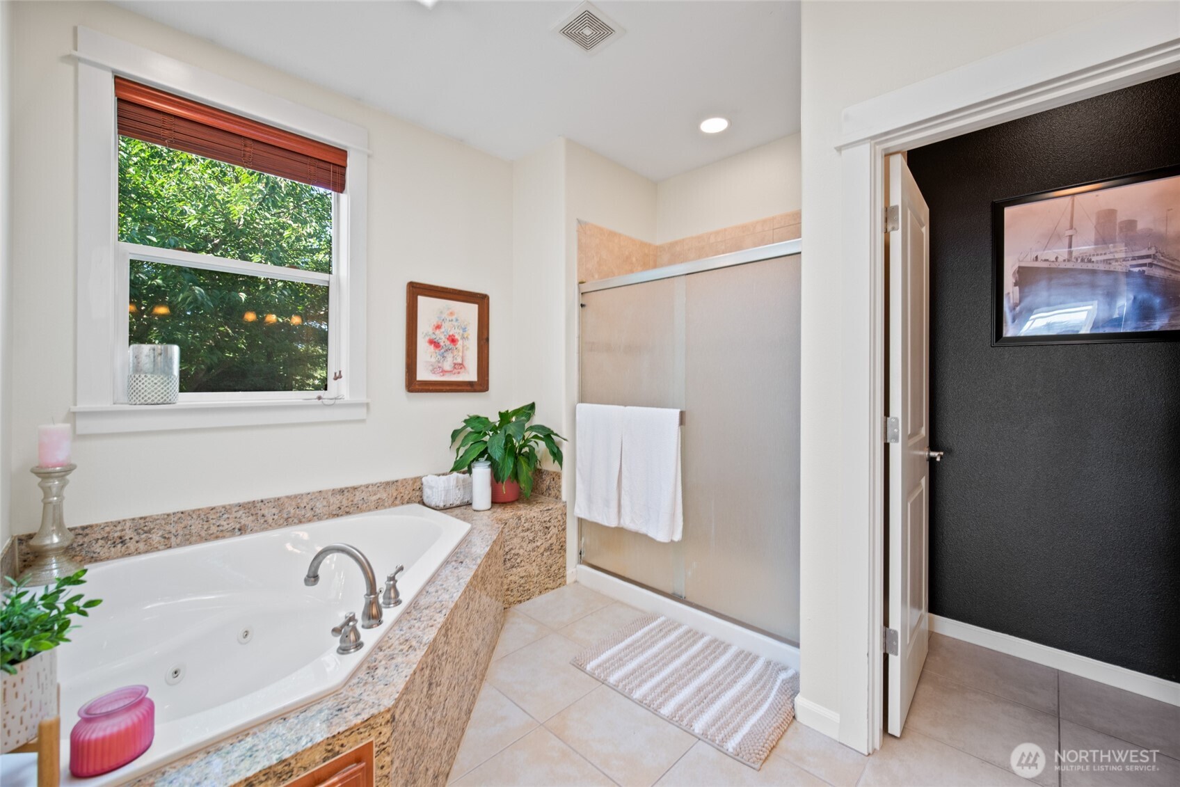 172 Blackjack Drive Kalama, WA 98625 - Photo 26 of 40 a bathroom with a tub a sink and next to a window