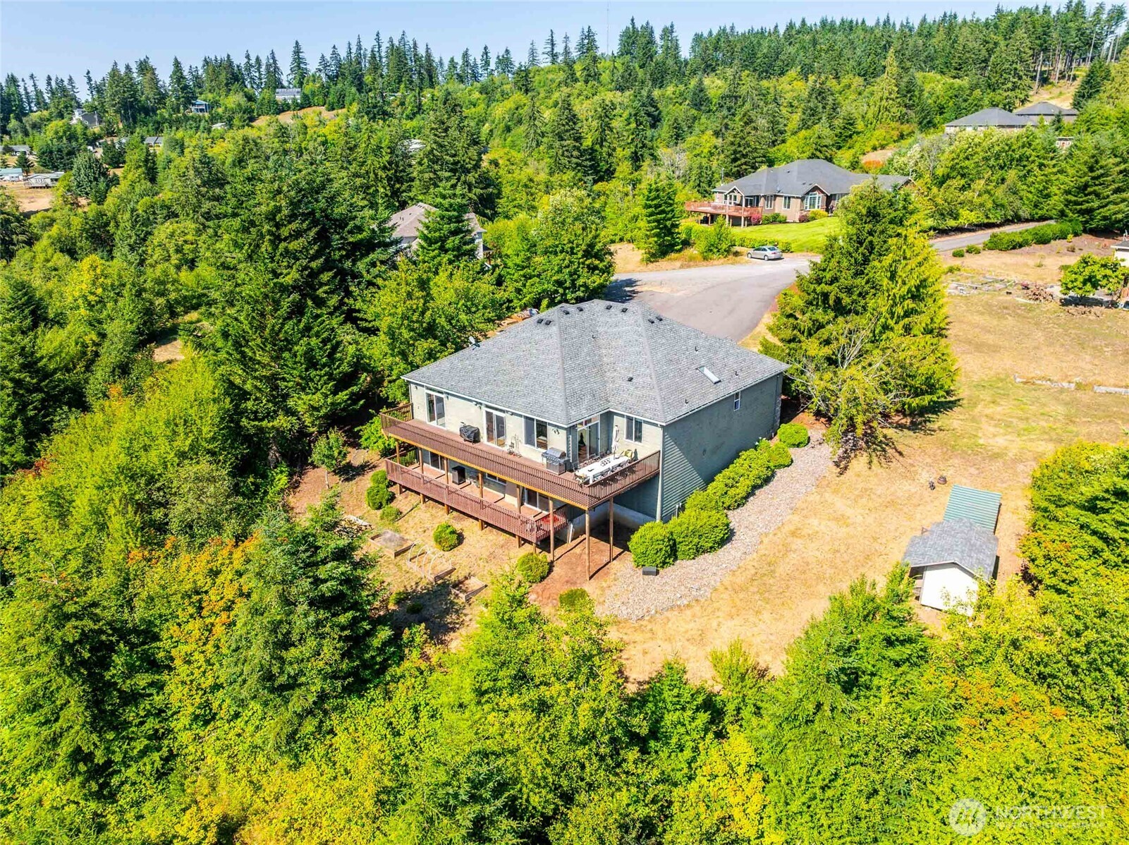 172 Blackjack Drive Kalama, WA 98625 - Photo 39 of 40 an aerial view of a house with a yard and lake view