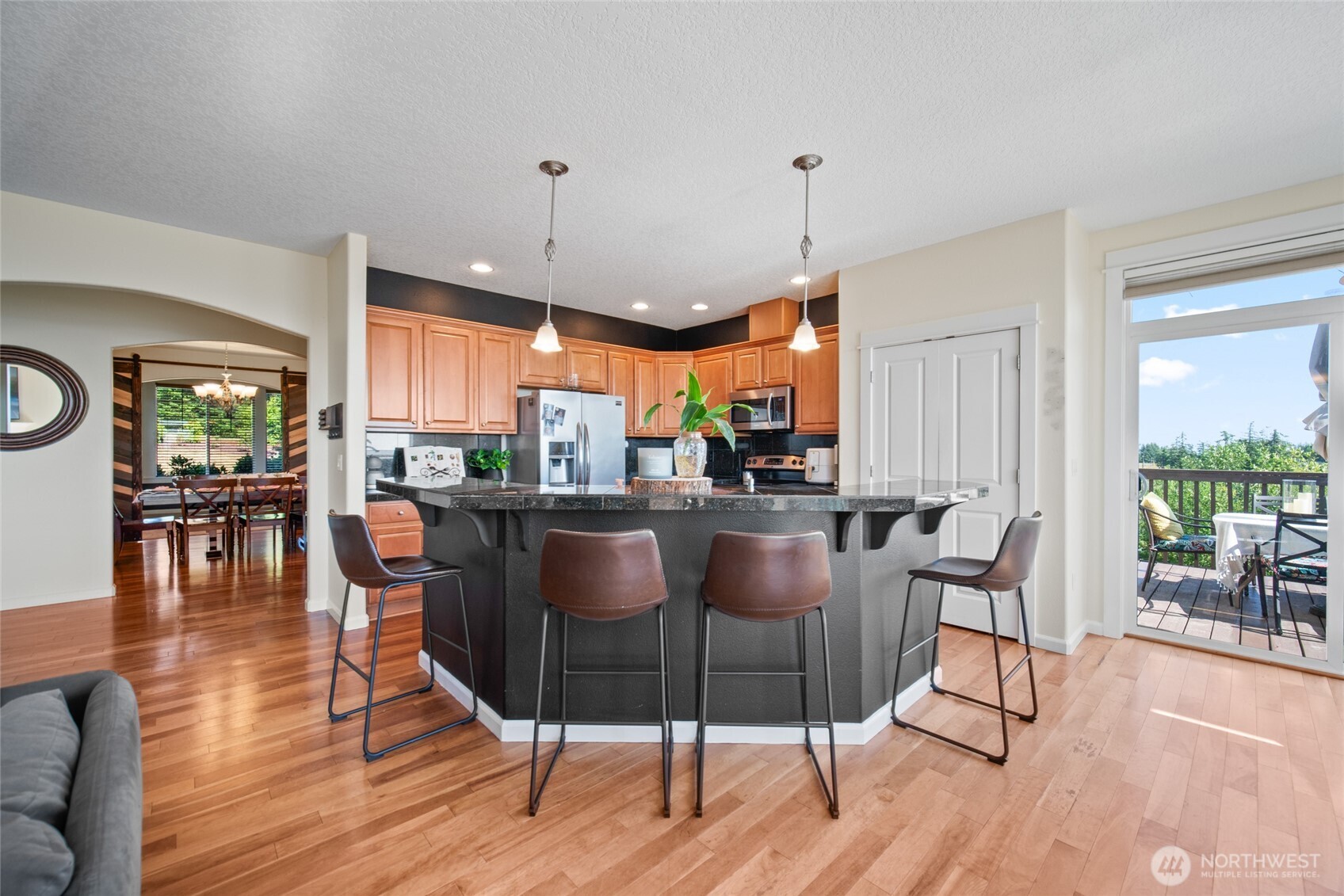 172 Blackjack Drive Kalama, WA 98625 - Photo 10 of 40 a view of a dining room with furniture window and wooden floor
