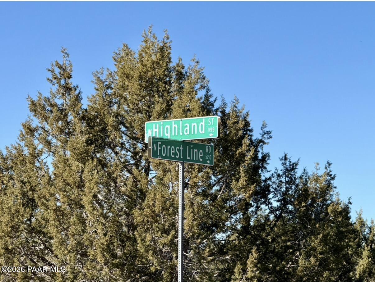 5190 North Forest Line Road Williams, AZ 86046 - Photo 3 of 11 a sign that is on a pole