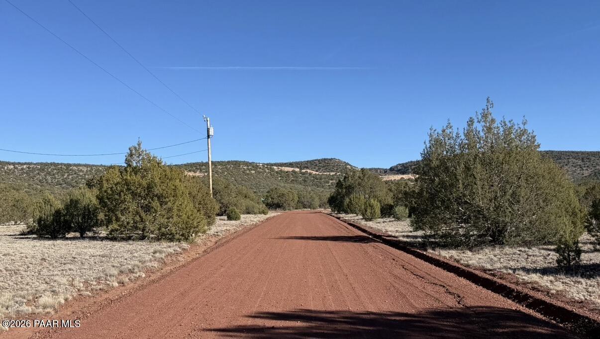 5190 North Forest Line Road Williams, AZ 86046 - Photo 10 of 11 a view of a road with a yard