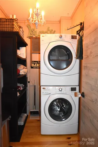 a view of a house with pool and sitting area
