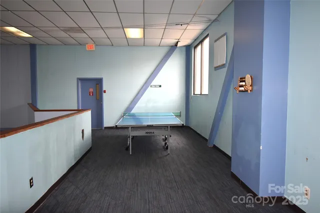 a view of balcony with furniture