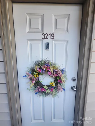 a view of a house with sitting area and barbeque area