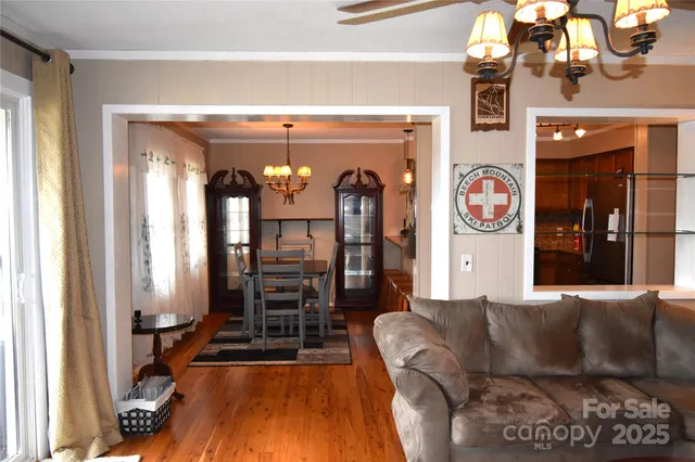 a view of hall way with furniture