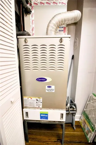 a view of a house with yard and sitting area