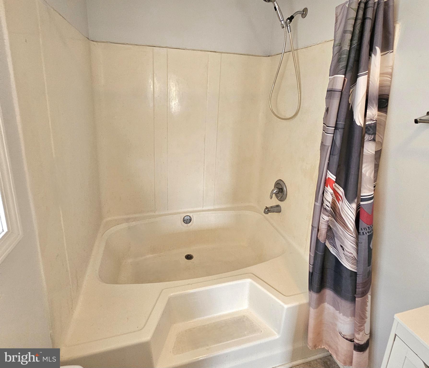103 State Street Elkton, MD 21921 - Photo 11 of 20 Sunken tub with shower space with sleek design.