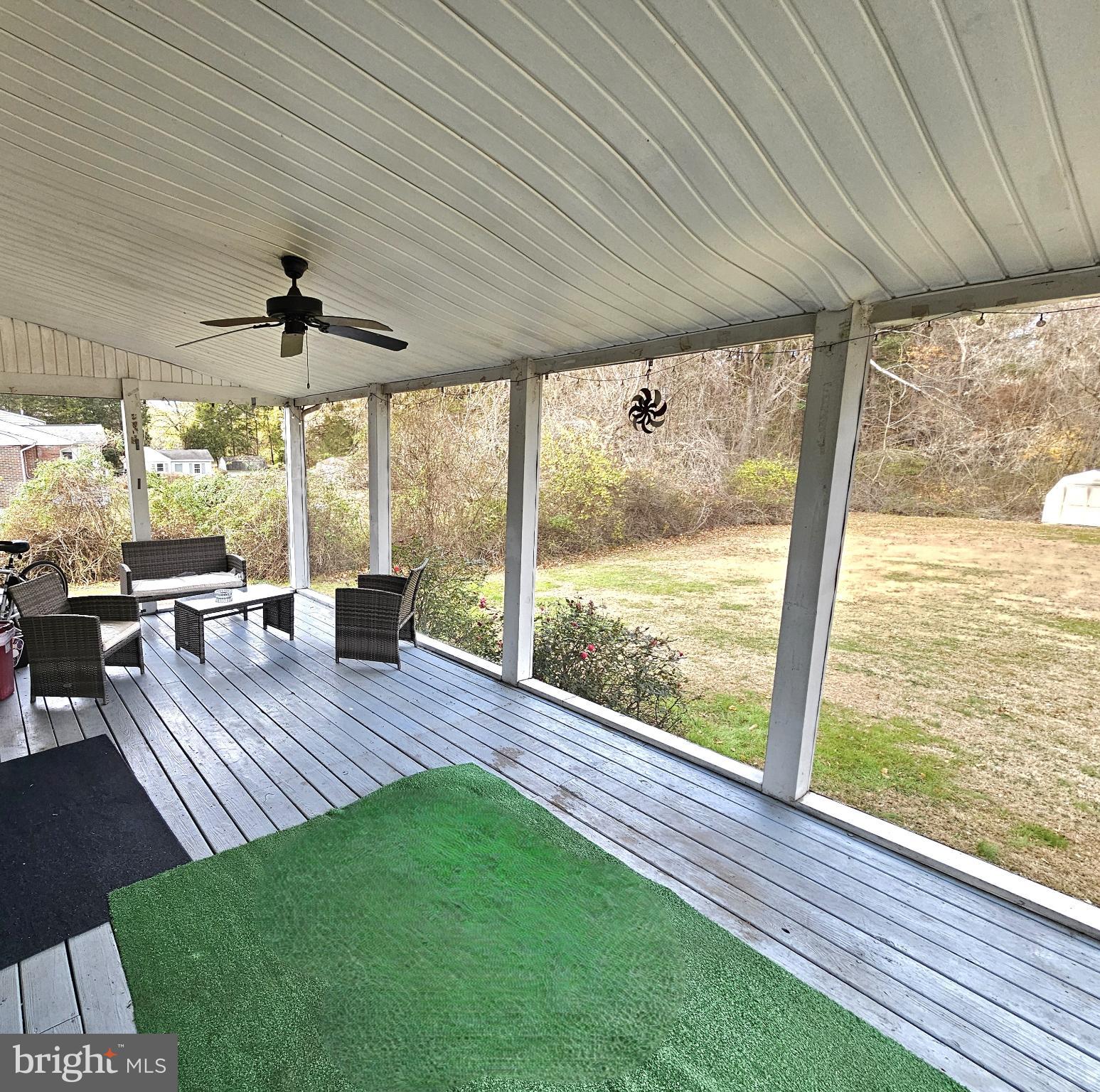 103 State Street Elkton, MD 21921 - Photo 17 of 20 Serene screenedporch with wooded surroundings.