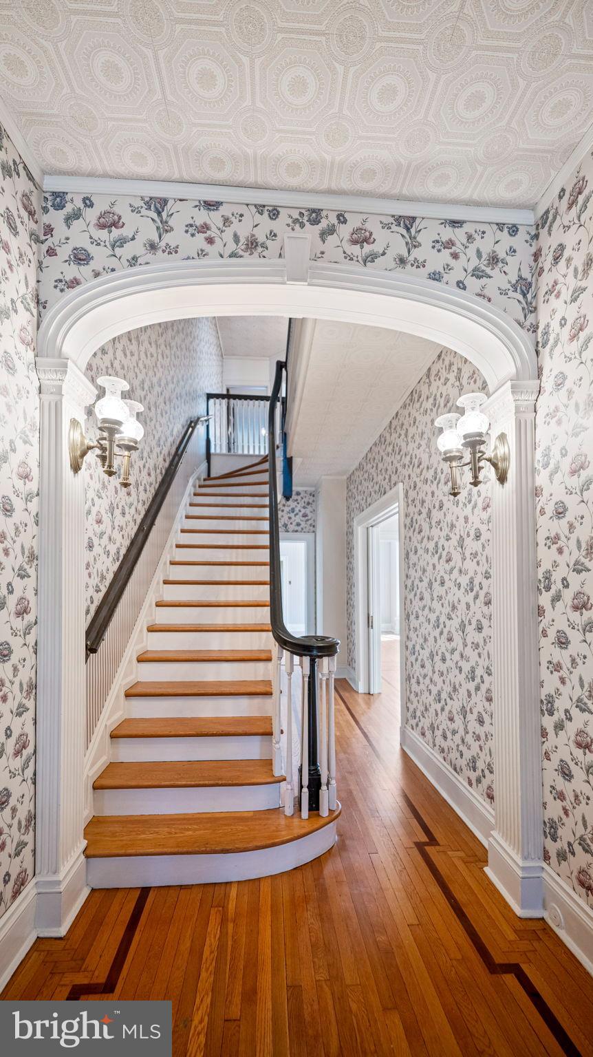 110 North Court Street Frederick, MD 21701 - Photo 11 of 28 a view of entryway and hall with wooden floor
