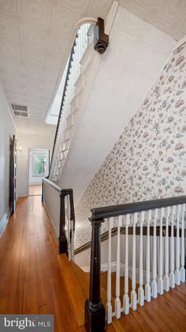 a view of a building with sitting area