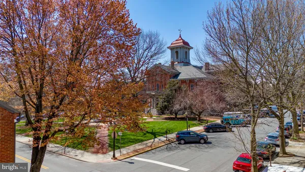 an aerial view of houses with outdoor space