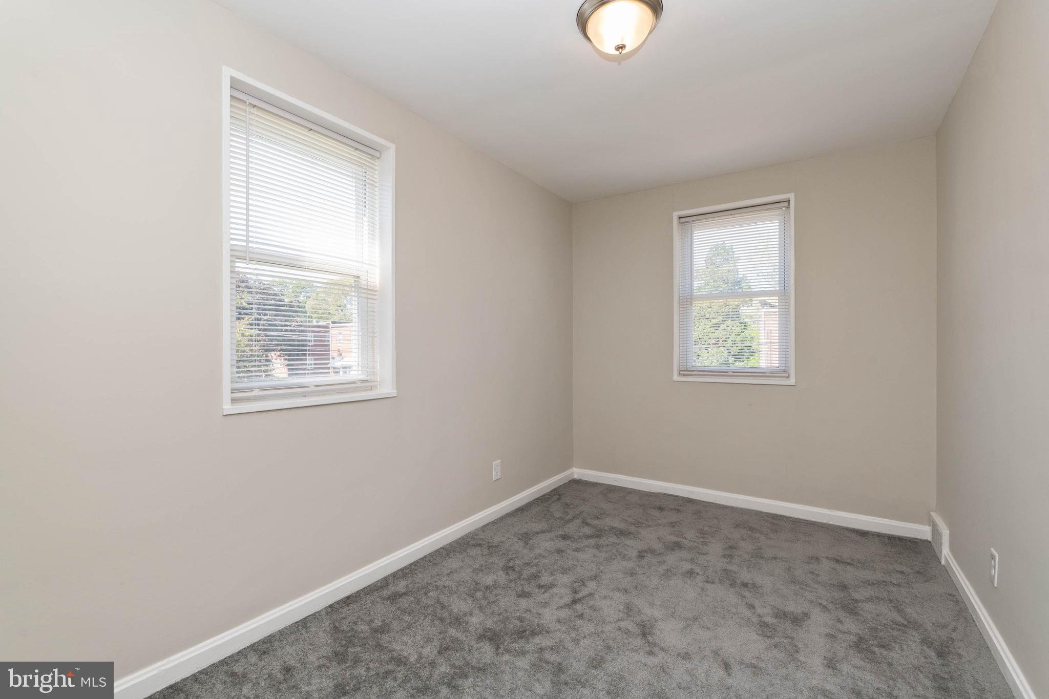 3718 Bartwood Road Baltimore, MD 21215 - Photo 14 of 27 Bedroom Two all new carpet and fresh paint