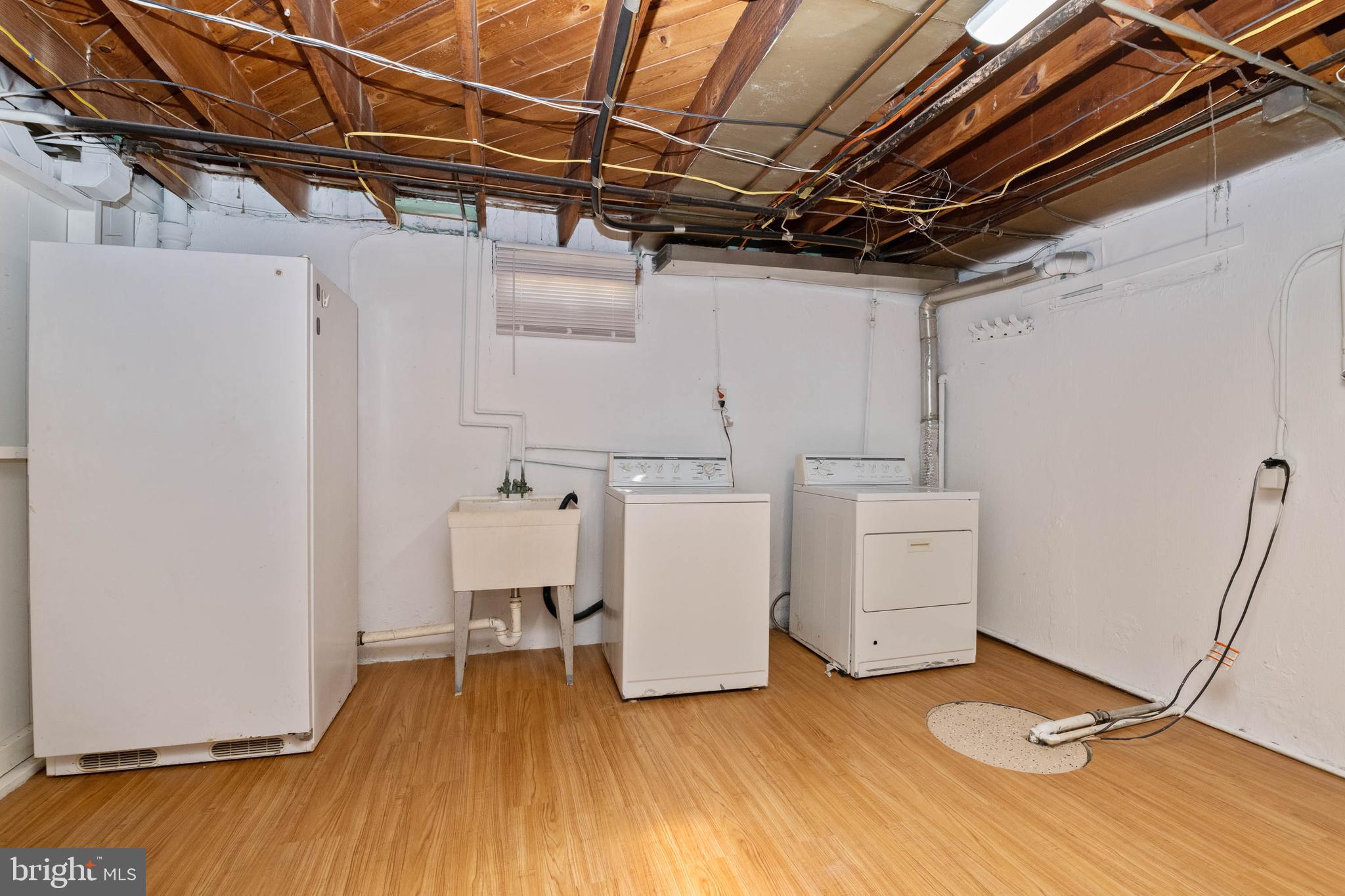 3718 Bartwood Road Baltimore, MD 21215 - Photo 21 of 27 Finished Laundry room