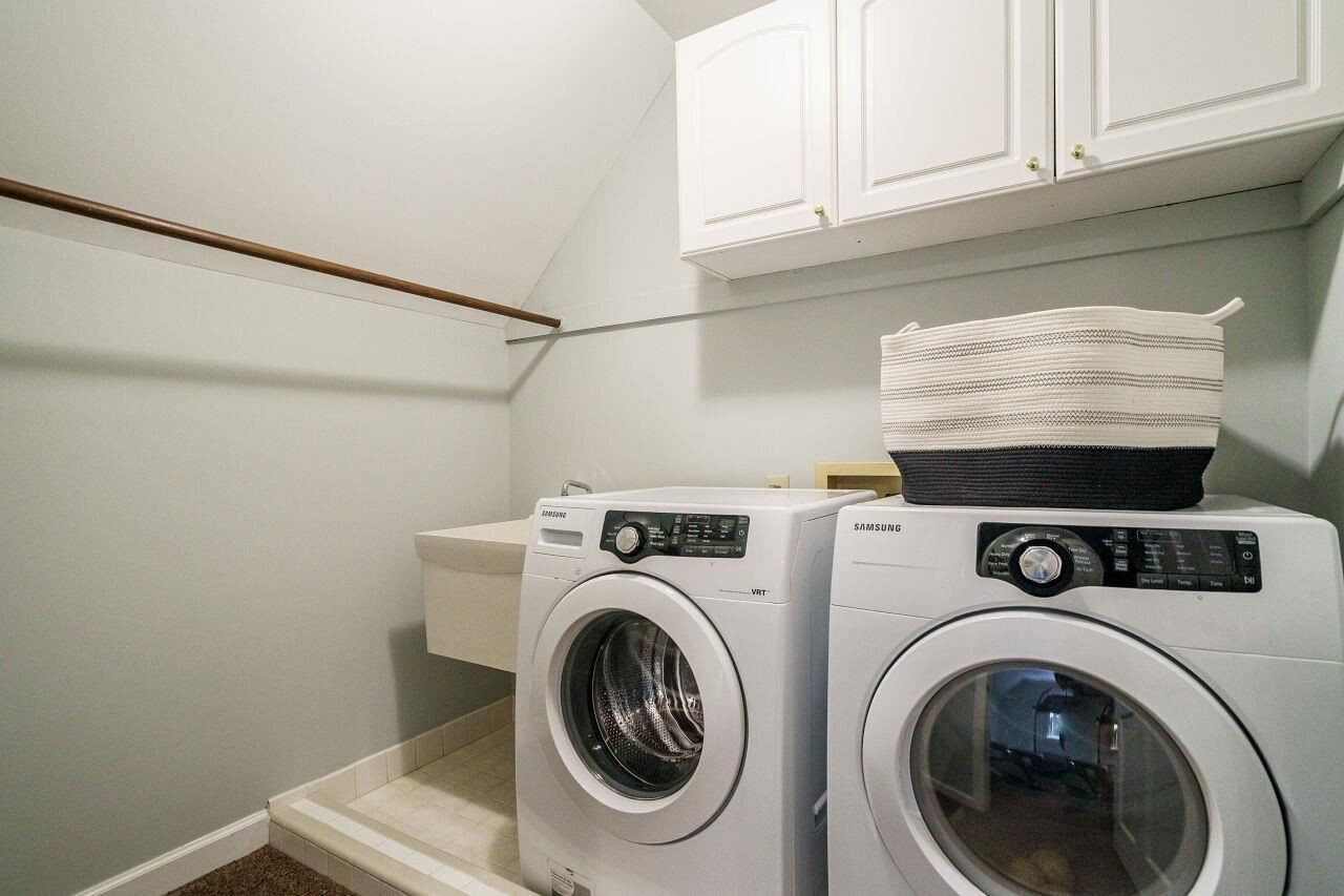 11000 Coachmans Way Raleigh, NC 27614 - Photo 24 of 30 Laundry Room with cabinets, sink and tile drain curb for appliances. Laundry Room