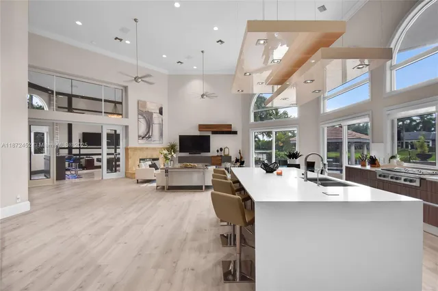 a bathroom with a sink a vanity and a mirror