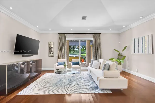 a large bathroom with a double vanity sink a mirror and a shower