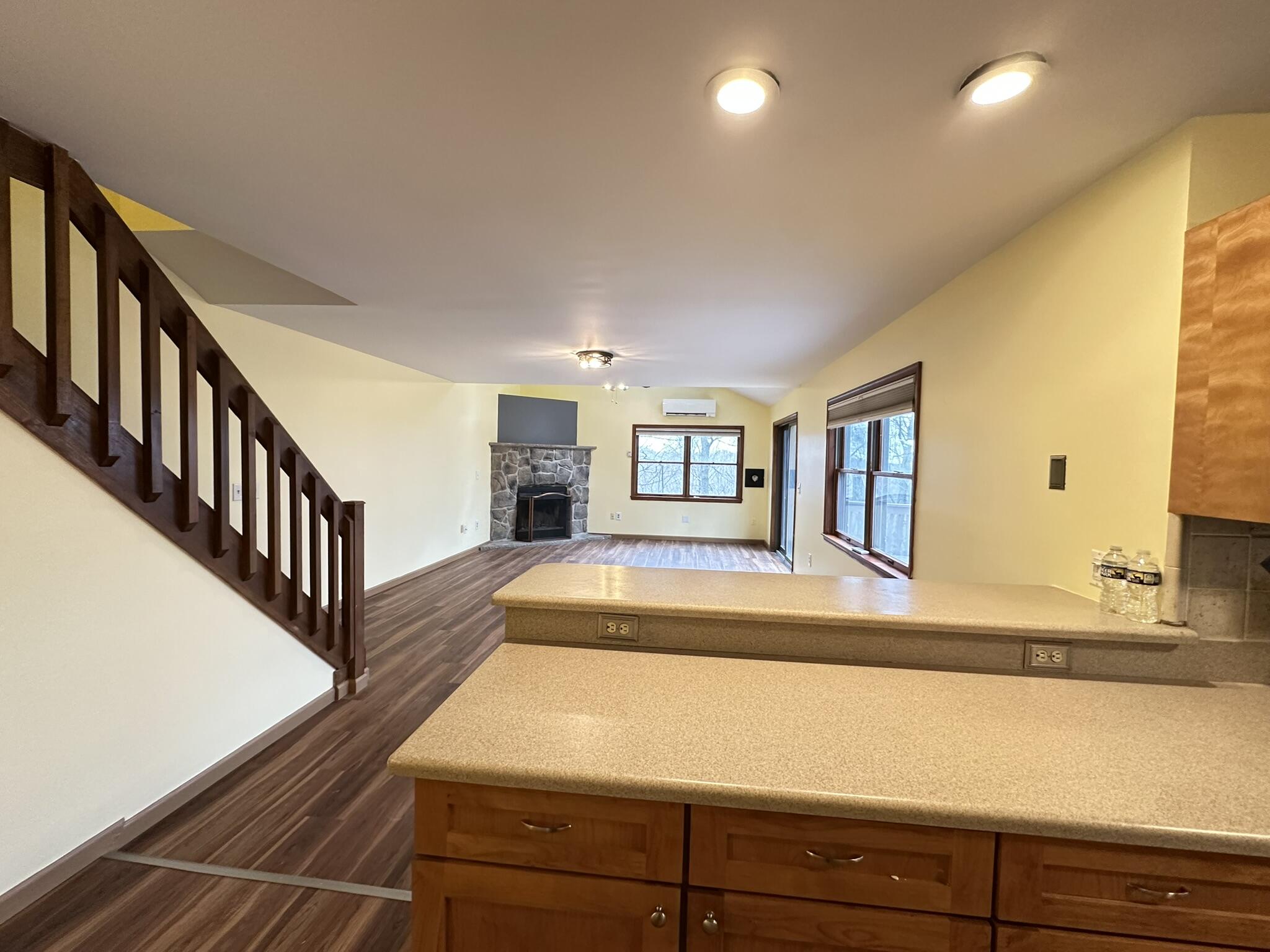 227 Image Drive Scotrun, PA 18355 - Photo 14 of 37 a view of a livingroom with wooden floor and stairs