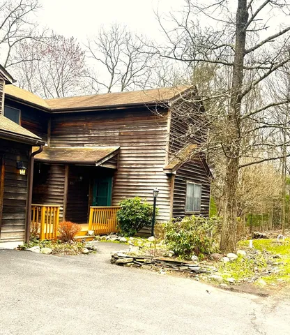a front view of a house with a patio