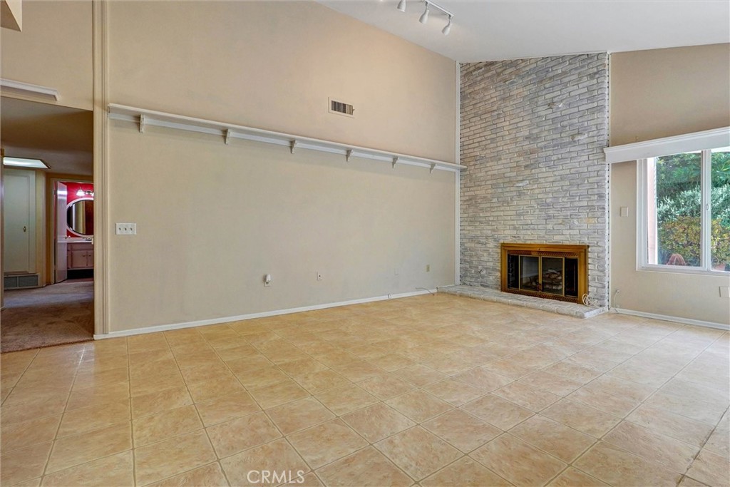 11500 Yolanda Avenue Porter Ranch, CA 91326 - Photo 10 of 29 Kitchen with fireplace