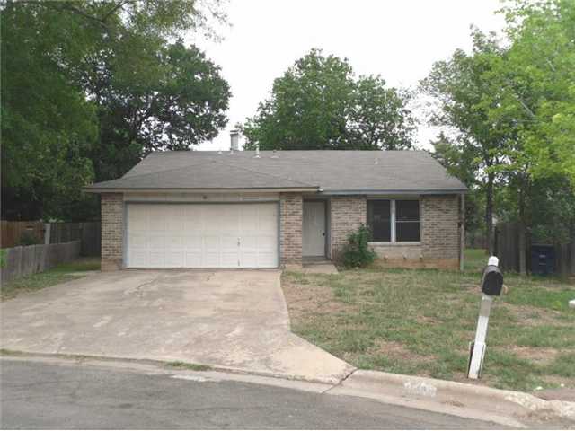 4704 Rue Le Fleur Austin, TX 78744 - Photo 1 of 1 a front view of a house with garden