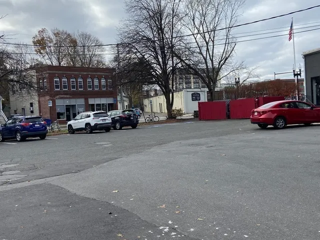 a view of a cars parked in front of a building