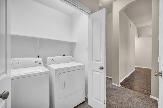 a utility room with dryer and washer