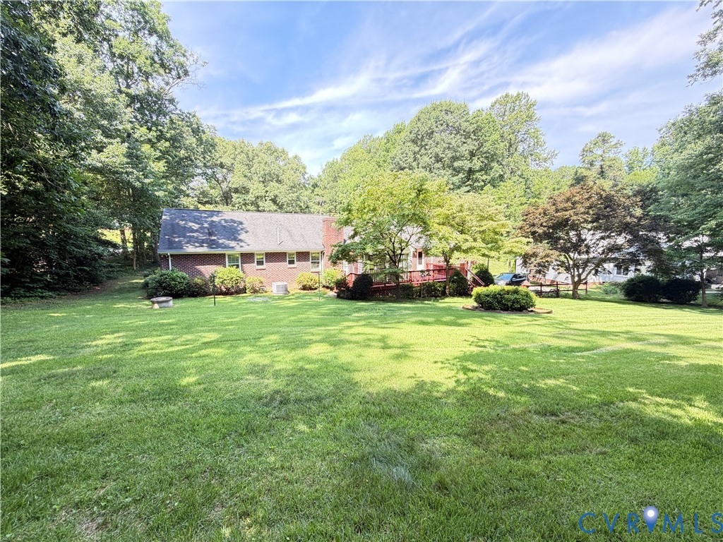 3933 Dunraven Road North Chesterfield, VA 23236 - Photo 10 of 30 a view of a yard with cars