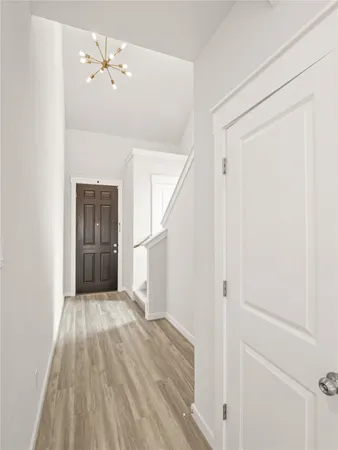 a balcony with furniture and garden view