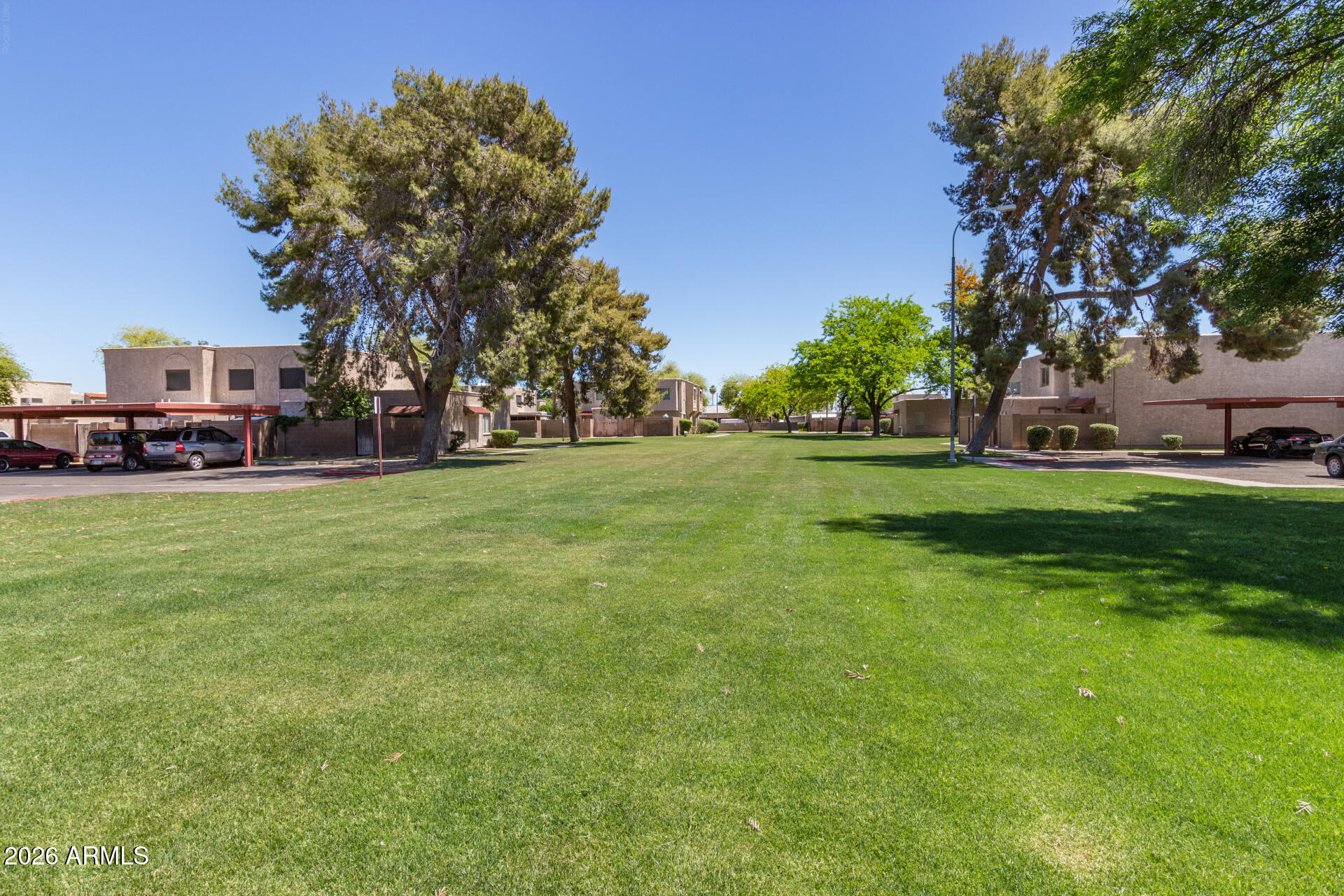 600 South Dobson Road, Unit 177 Mesa, AZ 85202 - Photo 23 of 24 a view of a field of grass and trees