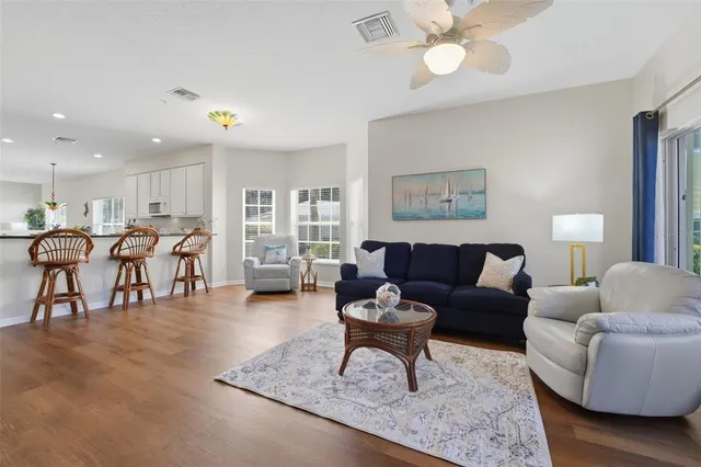 a living room with furniture and a table