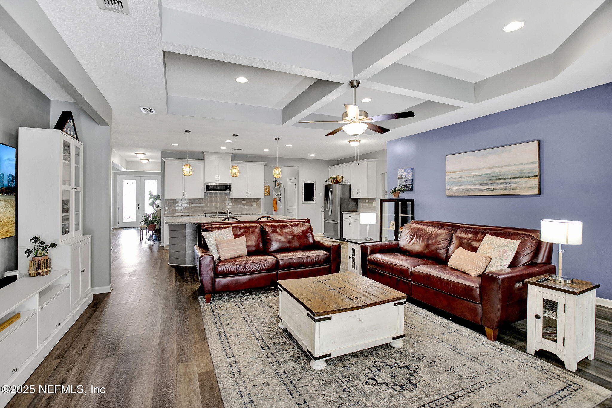 424 Willow Lake Drive St. Augustine, FL 32092 - Photo 18 of 52 a living room with furniture and a flat screen tv