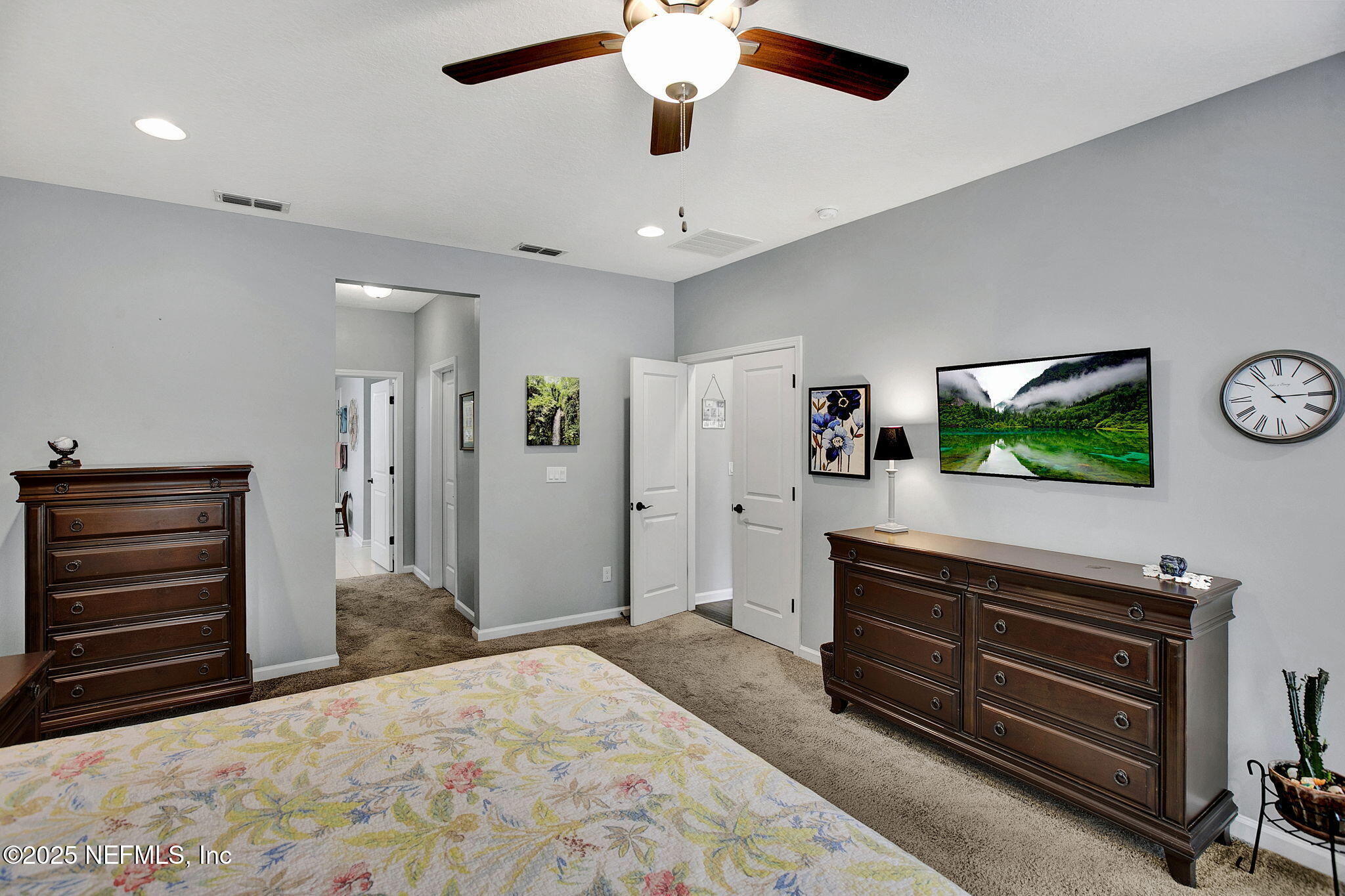 424 Willow Lake Drive St. Augustine, FL 32092 - Photo 21 of 52 a bedroom with furniture and a flat screen tv