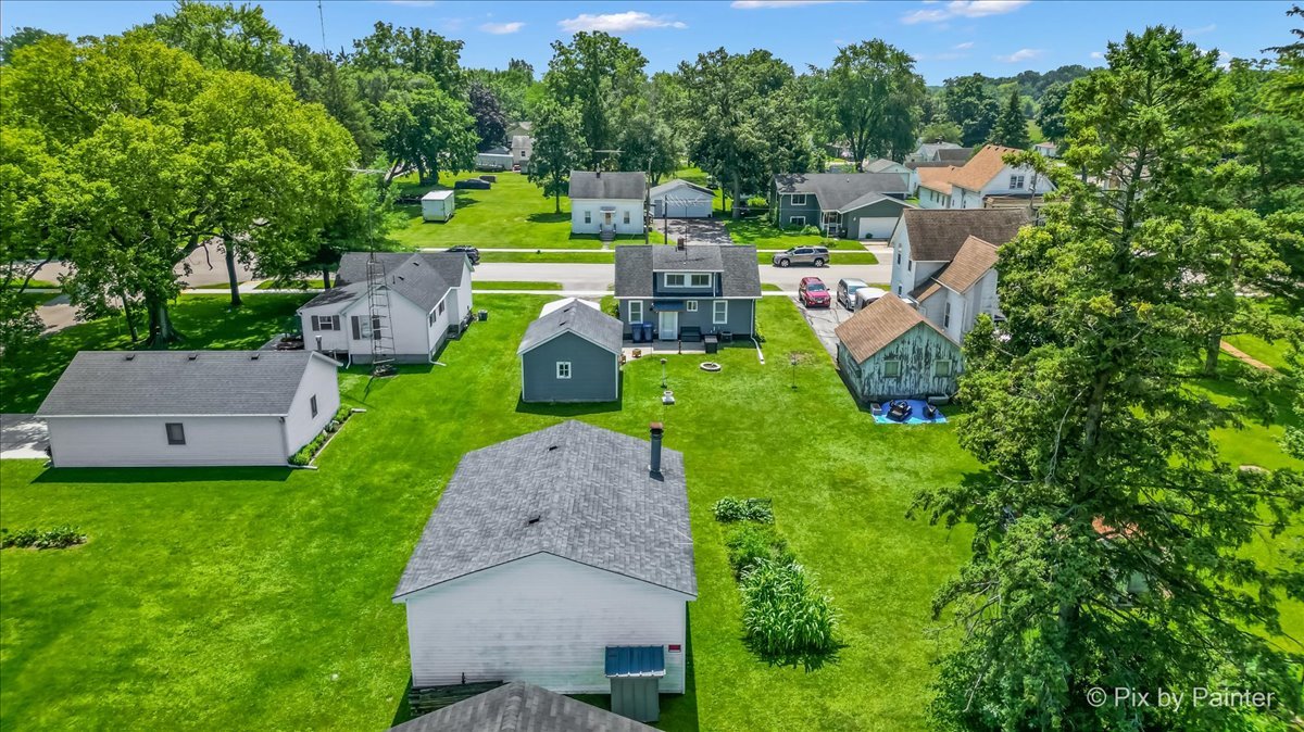 335 Ogden Street Capron, IL 61012 - Photo 10 of 18 an aerial view of a house with a garden