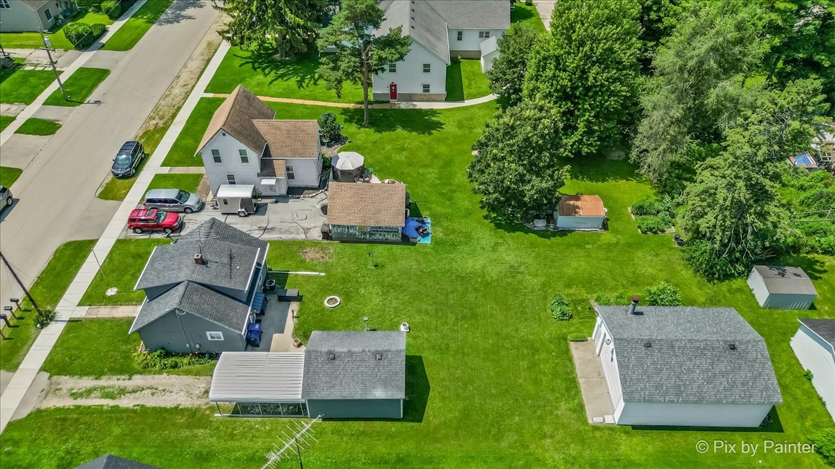 335 Ogden Street Capron, IL 61012 - Photo 14 of 18 aerial view of house with yard