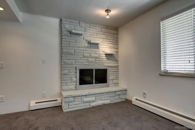 a view of a storage and utility room with washer and dryer