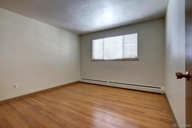 a view of a patio with couches and potted plants