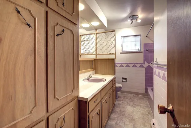 a view of a porch with furniture and next to a yard