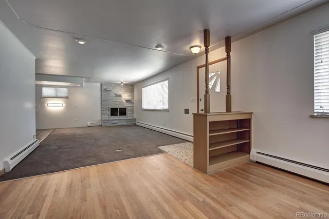 a kitchen with stainless steel appliances granite countertop a sink stove and microwave