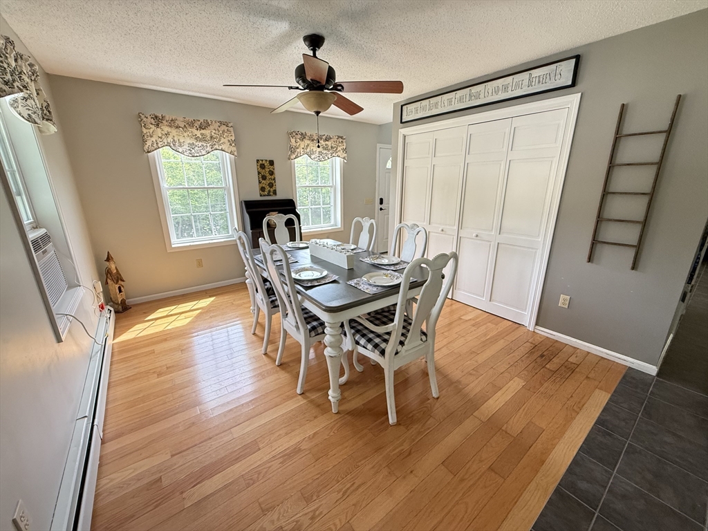 222 Bridge Street Warren, MA 01083 - Photo 9 of 40 a view of a dining room with furniture window and wooden floor