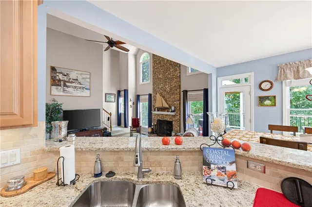 a living room filled with furniture and window