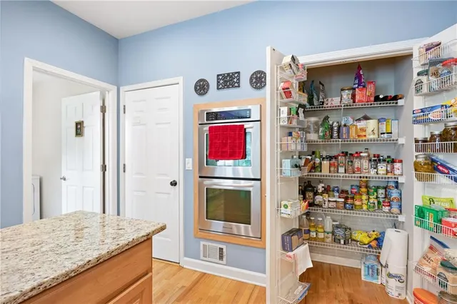 a room with storage and utility