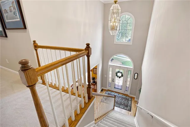 a view of a livingroom with furniture and a wooden floor